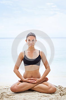 Woman In Relaxation On Tropical Beach with sand , body parts .yoga, and meditation