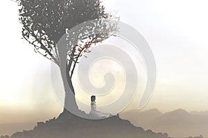 Woman relaxes doing yoga under a tree