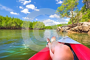 Woman relaxes on Kayak