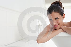Woman Relaxing In Bathtub