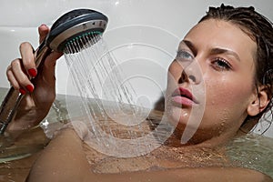 Woman relaxing in bathtub