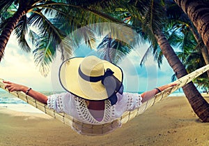 Woman relaxing at the beach