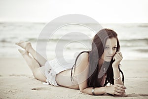 Woman relaxing on beach