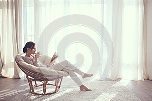 Woman relaxing in chair photo