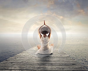 Woman relaxing doing yoga