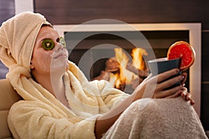 Woman relaxing in facial mask