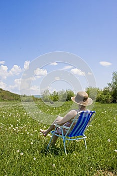 woman relaxing in the grass