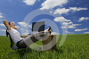 Woman Relaxing In a Green Office