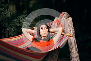 Woman Relaxing in Hammock on Summer Vacation