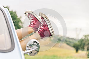 Woman relaxing in her car