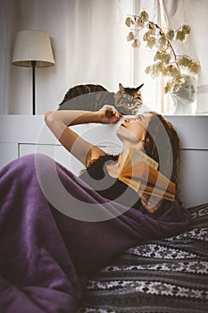 Woman is relaxing at home.