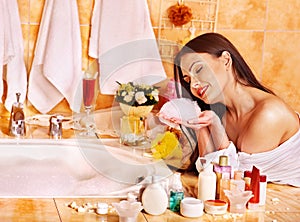 Woman relaxing at home bath.