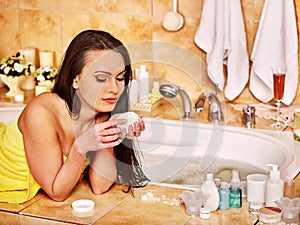 Woman relaxing at home bath