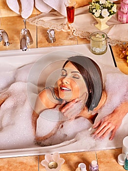 Woman relaxing at home bath