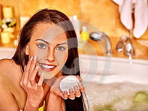 Woman relaxing at home bath