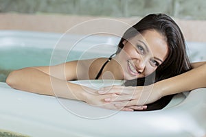 Woman relaxing in the hot tub