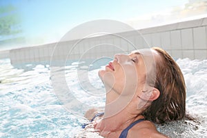 Woman relaxing in hot tub after a long working day