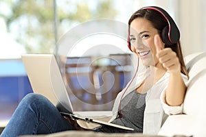 Woman relaxing listening music looking at you