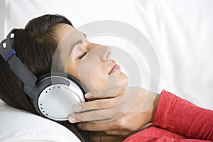 Woman Relaxing Listening To Music