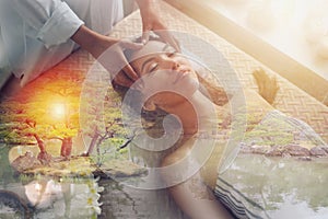 Woman relaxing with a massage in a spa center