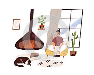 Woman relaxing and meditating in modern cozy living room at home, sitting in comfortable armchair by fireplace. Peaceful