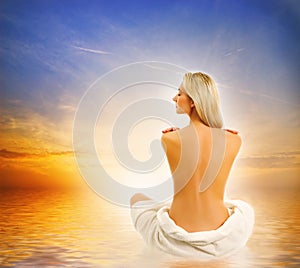 Woman relaxing near the sea