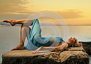 Woman relaxing near the sea