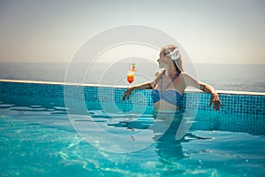 Woman relaxing at the pool