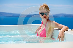 Woman relaxing in pool