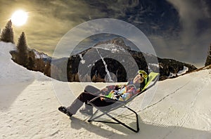 Woman Relaxing After Ski, Dolomites, Italy