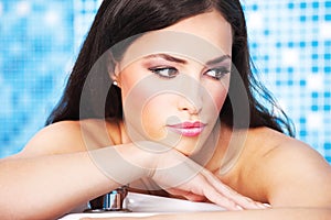 Woman relaxing in spa center