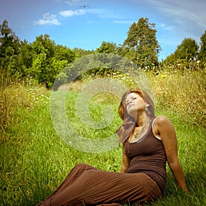 Woman relaxing in the summer sun