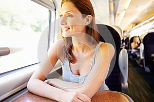 Woman Relaxing On Train Journey