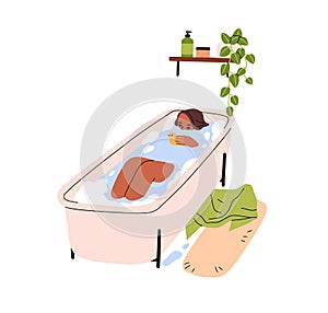 Woman relaxing in water in bathtub. Young adult girl taking bath with foam and duck toy. Person resting at home bathroom