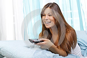 Woman with a remote control