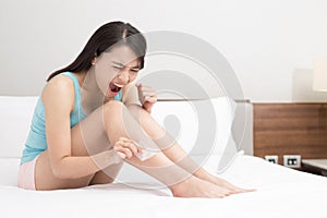 Woman remove leg hair photo