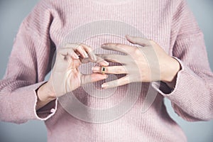 Woman remove  ring photo