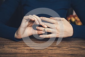Woman remove the wedding ring