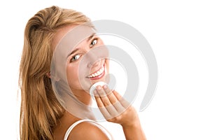 Woman removing makeup