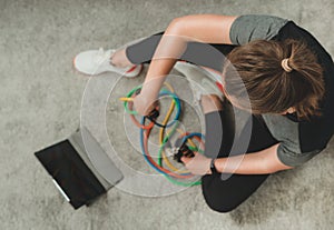 Woman with resistance bands