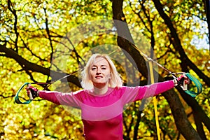 Woman Resistance training in park