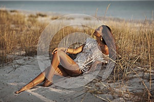 Woman Resting on the Beach During Vacations