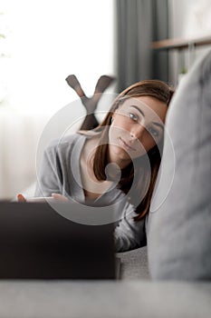 Woman resting with laptop