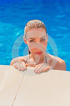 Woman resting at pool, vacation and travels concept