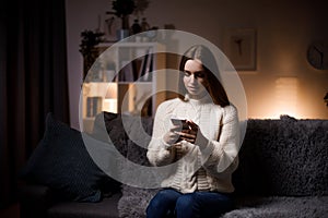 Woman resting with smartphone
