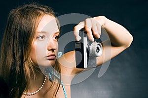 Woman with a retro camera