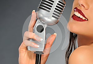 Woman with a retro microphone