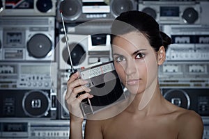 Woman with retro radio and Boom Box