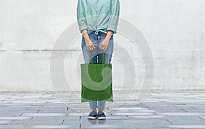 woman with reusable canvas bag for food shopping