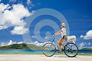 Woman ride along The Beach